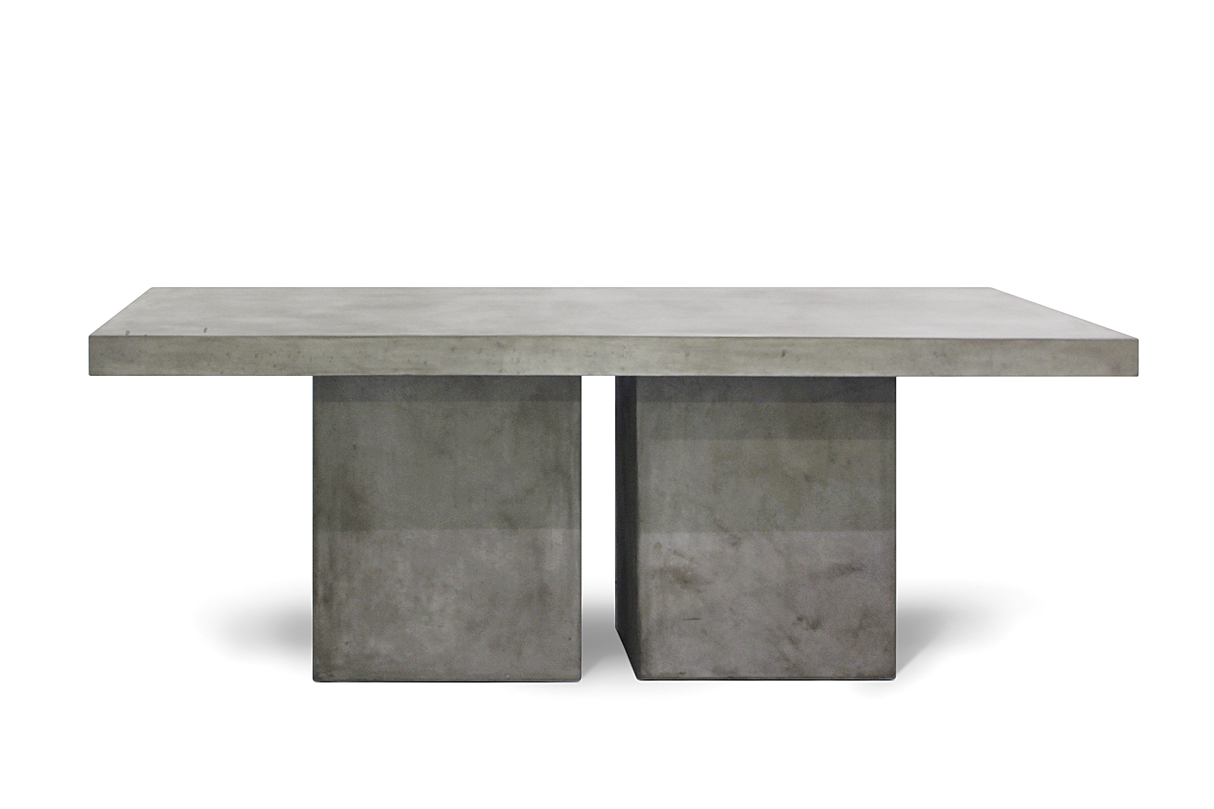 Stort spisebord laget av betong for utendørs eller stue